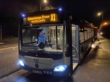 X1 bus at night