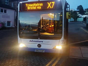 X7 bus at night